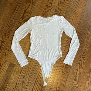 Vitality white body suit